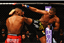 ATLANTA, GA - APRIL 21:  Rashad Evans (R) kicks Jon Jones during their light heavyweight title bout for UFC 145 at Philips Arena on April 21, 2012 in Atlanta, Georgia.  (Photo by Al Bello/Zuffa LLC/Zuffa LLC via Getty Images)