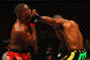 ATLANTA, GA - APRIL 21:  Rashad Evans (R) hits Jon Jones during their light heavyweight title bout for UFC 145 at Philips Arena on April 21, 2012 in Atlanta, Georgia.  (Photo by Al Bello/Zuffa LLC/Zuffa LLC via Getty Images)