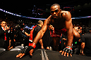 ATLANTA, GA - APRIL 21:  Jon Jones climbs into the octagon for his light heavyweight title bout with Rashad Evans for UFC 145 at Philips Arena on April 21, 2012 in Atlanta, Georgia.  (Photo by Al Bello/Zuffa LLC/Zuffa LLC via Getty Images)