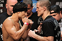 EAST RUTHERFORD, NJ - MAY 04:  (L-R) Lightweight opponents Danny Castillo and John Cholish face off after weighing in during the UFC on FOX official weigh in at Izod Center on May 4, 2012 in East Rutherford, New Jersey.  (Photo by Josh Hedges/Zuffa LLC/Zuffa LLC via Getty Images)
