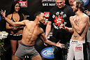 EAST RUTHERFORD, NJ - MAY 04:  (L-R) Flyweight opponents John Dodson and Timothy Elliot face off after weighing in during the UFC on FOX official weigh in at Izod Center on May 4, 2012 in East Rutherford, New Jersey.  (Photo by Josh Hedges/Zuffa LLC/Zuffa LLC via Getty Images)