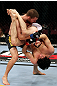 EAST RUTHERFORD, NJ - MAY 05:  Nick Denis slams Roland Delorme to the ground during thier Bantamweight bout at Izod Center on May 5, 2012 in East Rutherford, New Jersey.  (Photo by Josh Hedges/Zuffa LLC/Zuffa LLC via Getty Images)