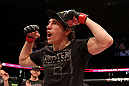 EAST RUTHERFORD, NJ - MAY 05:  Roland Delorme celebrates after defeating Nick Denis in thier Bantamweight bout at Izod Center on May 5, 2012 in East Rutherford, New Jersey.  (Photo by Josh Hedges/Zuffa LLC/Zuffa LLC via Getty Images)