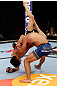 EAST RUTHERFORD, NJ - MAY 05:  Dennis Bermudez slams Pablo Garza to the ground during thier Bantamweight bout at Izod Center on May 5, 2012 in East Rutherford, New Jersey.  (Photo by Josh Hedges/Zuffa LLC/Zuffa LLC via Getty Images)