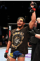 EAST RUTHERFORD, NJ - MAY 05:  Dennis Bermudez celebrates after defeating Pablo Garza in thier Bantamweight bout at Izod Center on May 5, 2012 in East Rutherford, New Jersey.  (Photo by Josh Hedges/Zuffa LLC/Zuffa LLC via Getty Images)