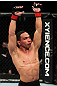 EAST RUTHERFORD, NJ - MAY 05:  John Dodson celebrates after defeating Timothy Elliott during thier Flyweight bout at Izod Center on May 5, 2012 in East Rutherford, New Jersey.  (Photo by Josh Hedges/Zuffa LLC/Zuffa LLC via Getty Images)