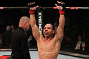 EAST RUTHERFORD, NJ - MAY 05:  John Dodson celebrates after defeating Timothy Elliott during thier Flyweight bout at Izod Center on May 5, 2012 in East Rutherford, New Jersey.  (Photo by Josh Hedges/Zuffa LLC/Zuffa LLC via Getty Images)