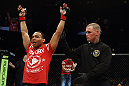 EAST RUTHERFORD, NJ - MAY 05:  John Dodson celebrates after defeating Timothy Elliott during thier Flyweight bout at Izod Center on May 5, 2012 in East Rutherford, New Jersey.  (Photo by Josh Hedges/Zuffa LLC/Zuffa LLC via Getty Images)