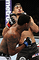 EAST RUTHERFORD, NJ - MAY 05:  Michael Johnson punches Tony Ferguson during thier Flyweight bout at Izod Center on May 5, 2012 in East Rutherford, New Jersey.  (Photo by Josh Hedges/Zuffa LLC/Zuffa LLC via Getty Images)