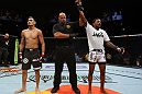 EAST RUTHERFORD, NJ - MAY 05:  Michael Johnson(R) celebrates after defeating Tony Ferguson (L) in thier Flyweight bout at Izod Center on May 5, 2012 in East Rutherford, New Jersey.  (Photo by Josh Hedges/Zuffa LLC/Zuffa LLC via Getty Images)