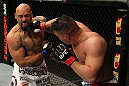 EAST RUTHERFORD, NJ - MAY 05: Pat Barry (R) punches Lavar Johnson (L) during thier Heavyweight bout at Izod Center on May 5, 2012 in East Rutherford, New Jersey.  (Photo by Josh Hedges/Zuffa LLC/Zuffa LLC via Getty Images)