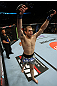 EAST RUTHERFORD, NJ - MAY 05:  Alan Belcher celebrates after defeating Rousimar Palhares in thier Middleweight bout at Izod Center on May 5, 2012 in East Rutherford, New Jersey.  (Photo by Josh Hedges/Zuffa LLC/Zuffa LLC via Getty Images)