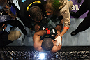 EAST RUTHERFORD, NJ - MAY 05:  Rousimar Palhares gets looked over by his team after being defeated by Alan Belcher in thier Middleweight bout at Izod Center on May 5, 2012 in East Rutherford, New Jersey.  (Photo by Josh Hedges/Zuffa LLC/Zuffa LLC via Getty Images)
