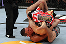 EAST RUTHERFORD, NJ - MAY 05:  Nate Diaz Takes down Jim Miller during thier Lightweight bout at Izod Center on May 5, 2012 in East Rutherford, New Jersey.  (Photo by Josh Hedges/Zuffa LLC/Zuffa LLC via Getty Images)