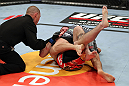 EAST RUTHERFORD, NJ - MAY 05:  Nate Diaz Takes down Jim Miller during thier Lightweight bout at Izod Center on May 5, 2012 in East Rutherford, New Jersey.  (Photo by Josh Hedges/Zuffa LLC/Zuffa LLC via Getty Images)