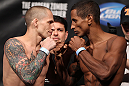 FAIRFAX, VA - MAY 14:  (L-R) Bantamweight opponents Jeff Curran and Johnny Eduardo face off after weighing in during the UFC on Fuel TV official weigh in at Patriot Center on May 14, 2012 in Fairfax, Virginia.  (Photo by Josh Hedges/Zuffa LLC/Zuffa LLC via Getty Images)