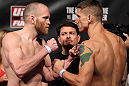 FAIRFAX, VA - MAY 14:  (L-R) Lightweight opponents TJ Grant and Carlo Prater face off after weighing during the UFC on Fuel TV official weigh in at Patriot Center on May 14, 2012 in Fairfax, Virginia.  (Photo by Josh Hedges/Zuffa LLC/Zuffa LLC via Getty Images)