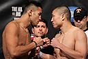 FAIRFAX, VA - MAY 14:  (L-R) Opponents Brad Tavares and Dongi Yang face off after weighing in during the UFC on Fuel TV official weigh in at Patriot Center on May 14, 2012 in Fairfax, Virginia.  (Photo by Josh Hedges/Zuffa LLC/Zuffa LLC via Getty Images)