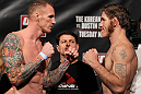FAIRFAX, VA - MAY 14:  (L-R) Middleweight opponents Jason MacDonald and Tom Lawlor face off after weighing in during the UFC on Fuel TV official weigh in at Patriot Center on May 14, 2012 in Fairfax, Virginia.  (Photo by Josh Hedges/Zuffa LLC/Zuffa LLC via Getty Images)