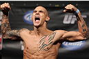 FAIRFAX, VA - MAY 14:  Dustin Poirier makes weight during the UFC on Fuel TV official weigh in at Patriot Center on May 14, 2012 in Fairfax, Virginia.  (Photo by Josh Hedges/Zuffa LLC/Zuffa LLC via Getty Images)