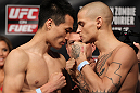 FAIRFAX, VA - MAY 14:  (L-R) Featherweight opponents "The Korean Zombie" Chan Sung Jung and Dustin Poirier face off after weighing in during the UFC on Fuel TV official weigh in at Patriot Center on May 14, 2012 in Fairfax, Virginia.  (Photo by Josh Hedges/Zuffa LLC/Zuffa LLC via Getty Images)