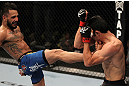 FAIRFAX, VA - MAY 15:  (L-R) Francisco Rivera kicks Alex Soto in a bantamweight bout during the UFC on Fuel TV event at Patriot Center on May 15, 2012 in Fairfax, Virginia.  (Photo by Josh Hedges/Zuffa LLC/Zuffa LLC via Getty Images)