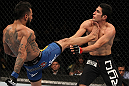 FAIRFAX, VA - MAY 15:  (L-R) Francisco Rivera kicks Alex Soto in a bantamweight bout during the UFC on Fuel TV event at Patriot Center on May 15, 2012 in Fairfax, Virginia.  (Photo by Josh Hedges/Zuffa LLC/Zuffa LLC via Getty Images)