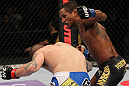 FAIRFAX, VA - MAY 15:  (R-L) Johnny Eduardo punches Jeff Curran in a bantamweight bout during the UFC on Fuel TV event at Patriot Center on May 15, 2012 in Fairfax, Virginia.  (Photo by Josh Hedges/Zuffa LLC/Zuffa LLC via Getty Images)
