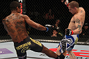 FAIRFAX, VA - MAY 15:  (L-R) Johnny Eduardo kicks Jeff Curran in a bantamweight bout during the UFC on Fuel TV event at Patriot Center on May 15, 2012 in Fairfax, Virginia.  (Photo by Josh Hedges/Zuffa LLC/Zuffa LLC via Getty Images)