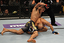 FAIRFAX, VA - MAY 15:  (L-R) Rafael Dos Anjos punches Kamal Shalorus in a lightweight bout during the UFC on Fuel TV event at Patriot Center on May 15, 2012 in Fairfax, Virginia.  (Photo by Josh Hedges/Zuffa LLC/Zuffa LLC via Getty Images)
