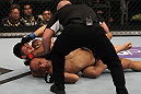 FAIRFAX, VA - MAY 15:  (L-R) Rafael Dos Anjos defeats Kamal Shalorus with a rear choke submisssion in a lightweight bout during the UFC on Fuel TV event at Patriot Center on May 15, 2012 in Fairfax, Virginia.  (Photo by Josh Hedges/Zuffa LLC/Zuffa LLC via Getty Images)