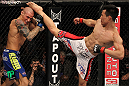 FAIRFAX, VA - MAY 15:  (R-L) "The Korean Zombie" Chan Sung Jung kicks Dustin Poirier in a featherweight bout during the UFC on Fuel TV event at Patriot Center on May 15, 2012 in Fairfax, Virginia.  (Photo by Josh Hedges/Zuffa LLC/Zuffa LLC via Getty Images)