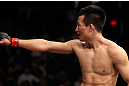 FAIRFAX, VA - MAY 15:  "The Korean Zombie" Chan Sung Jung reacts after defeating Dustin Poirier in a featherweight bout during the UFC on Fuel TV event at Patriot Center on May 15, 2012 in Fairfax, Virginia.  (Photo by Josh Hedges/Zuffa LLC/Zuffa LLC via Getty Images)