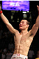 FAIRFAX, VA - MAY 15:  "The Korean Zombie" Chan Sung Jung reacts after defeating Dustin Poirier in a featherweight bout during the UFC on Fuel TV event at Patriot Center on May 15, 2012 in Fairfax, Virginia.  (Photo by Josh Hedges/Zuffa LLC/Zuffa LLC via Getty Images)