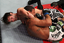 FAIRFAX, VA - MAY 15:  (L-R) Cody McKenzie defeats Marcus LeVesseur with a guillotine choke submission in a lightweight bout during the UFC on Fuel TV event at Patriot Center on May 15, 2012 in Fairfax, Virginia.  (Photo by Josh Hedges/Zuffa LLC/Zuffa LLC via Getty Images)