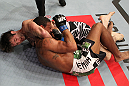 FAIRFAX, VA - MAY 15:  (L-R) Cody McKenzie defeats Marcus LeVesseur with a guillotine choke submission in a lightweight bout during the UFC on Fuel TV event at Patriot Center on May 15, 2012 in Fairfax, Virginia.  (Photo by Josh Hedges/Zuffa LLC/Zuffa LLC via Getty Images)