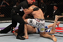 FAIRFAX, VA - MAY 15:  Tom Lawlor (R) defeats Jason MacDonald by TKO in a middleweight bout during the UFC on Fuel TV event at Patriot Center on May 15, 2012 in Fairfax, Virginia.  (Photo by Josh Hedges/Zuffa LLC/Zuffa LLC via Getty Images)