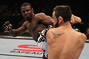 FAIRFAX, VA - MAY 15:  (L-R) Yves Jabouin kicks Jeff Hougland in a bantamweight bout during the UFC on Fuel TV event at Patriot Center on May 15, 2012 in Fairfax, Virginia.  (Photo by Josh Hedges/Zuffa LLC/Zuffa LLC via Getty Images)