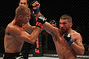 FAIRFAX, VA - MAY 15:  (R-L) Jeremy Stephens punches Donald "Cowboy" Cerrone in a lightweight bout during the UFC on Fuel TV event at Patriot Center on May 15, 2012 in Fairfax, Virginia.  (Photo by Josh Hedges/Zuffa LLC/Zuffa LLC via Getty Images)