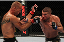 FAIRFAX, VA - MAY 15:  (R-L) Jeremy Stephens punches Donald "Cowboy" Cerrone in a lightweight bout during the UFC on Fuel TV event at Patriot Center on May 15, 2012 in Fairfax, Virginia.  (Photo by Josh Hedges/Zuffa LLC/Zuffa LLC via Getty Images)