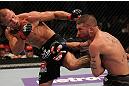 FAIRFAX, VA - MAY 15:  (L-R) Donald "Cowboy" Cerrone kicks Jeremy Stephens in a lightweight bout during the UFC on Fuel TV event at Patriot Center on May 15, 2012 in Fairfax, Virginia.  (Photo by Josh Hedges/Zuffa LLC/Zuffa LLC via Getty Images)