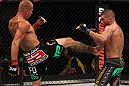 FAIRFAX, VA - MAY 15:  (L-R) Donald "Cowboy" Cerrone kicks Jeremy Stephens in a lightweight bout during the UFC on Fuel TV event at Patriot Center on May 15, 2012 in Fairfax, Virginia.  (Photo by Josh Hedges/Zuffa LLC/Zuffa LLC via Getty Images)