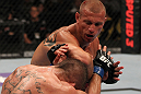 FAIRFAX, VA - MAY 15:  (R-L) Donald "Cowboy" Cerrone delivers an elbow strike against Jeremy Stephens in a lightweight bout during the UFC on Fuel TV event at Patriot Center on May 15, 2012 in Fairfax, Virginia.  (Photo by Josh Hedges/Zuffa LLC/Zuffa LLC via Getty Images)