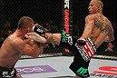FAIRFAX, VA - MAY 15:  (R-L) Donald "Cowboy" Cerrone kicks Jeremy Stephens in a lightweight bout during the UFC on Fuel TV event at Patriot Center on May 15, 2012 in Fairfax, Virginia.  (Photo by Josh Hedges/Zuffa LLC/Zuffa LLC via Getty Images)