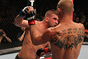 FAIRFAX, VA - MAY 15:  (L-R) Jeremy Stephens punches Donald "Cowboy" Cerrone in a lightweight bout during the UFC on Fuel TV event at Patriot Center on May 15, 2012 in Fairfax, Virginia.  (Photo by Josh Hedges/Zuffa LLC/Zuffa LLC via Getty Images)