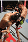 FAIRFAX, VA - MAY 15:  (R-L) Amir Sadollah kicks Jorge Lopez in a welterweight bout during the UFC on Fuel TV event at Patriot Center on May 15, 2012 in Fairfax, Virginia.  (Photo by Josh Hedges/Zuffa LLC/Zuffa LLC via Getty Images)