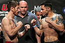 LAS VEGAS, NV - MAY 25:   (L-R) Opponents Mike Brown and Daniel Pineda face off after making weight during the UFC 146 official weigh in at the MGM Grand Garden Arena on May 25, 2012 in Las Vegas, Nevada.  (Photo by Josh Hedges/Zuffa LLC/Zuffa LLC via Getty Images)
