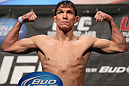 LAS VEGAS, NV - MAY 25:   Darren Elkins makes weight during the UFC 146 official weigh in at the MGM Grand Garden Arena on May 25, 2012 in Las Vegas, Nevada.  (Photo by Josh Hedges/Zuffa LLC/Zuffa LLC via Getty Images)