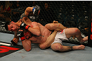 LAS VEGAS, NV - MAY 26:  Daniel Pineda (top) punches Mike Brown on the ground during a featherweight bout at UFC 146 at MGM Grand Garden Arena on May 26, 2012 in Las Vegas, Nevada.  (Photo by Donald Miralle/Zuffa LLC/Zuffa LLC via Getty Images)