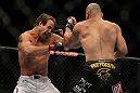 LAS VEGAS, NV - MAY 26:  Glover Teixeira (right) punches Kyle Kingsbury during a light heavyweight bout at UFC 146 at MGM Grand Garden Arena on May 26, 2012 in Las Vegas, Nevada.  (Photo by Josh Hedges/Zuffa LLC/Zuffa LLC via Getty Images)